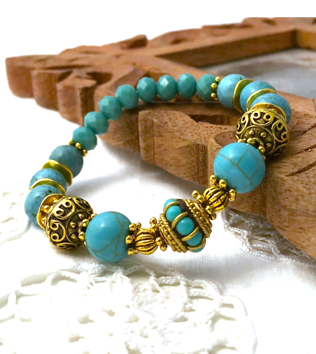 Boho stretch armband in turquoise met goud