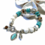 Turquoise Bedel Armband met Tijgeroog in zilver