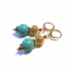 Kleurrijke Statement Oorbellen in goud, turquoise en rood 4