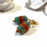 Grote turquoise met rode statement oorbellen