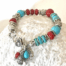 Rood met turquoise boeddha armband in zilver