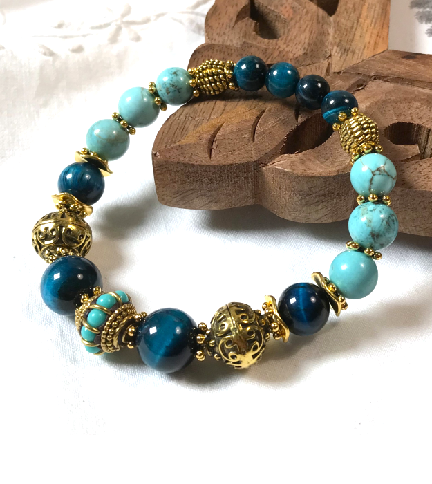 Blauwe Tijgeroog Armband met turquoise in goud